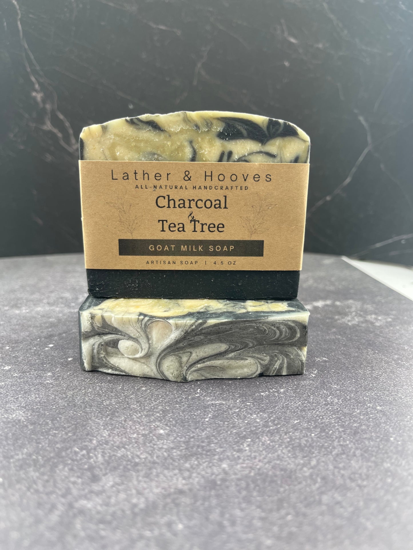 Charcoal & Tea Tree - A refreshing swirl of charcoal and botanicals for naturally clean, balanced skin.