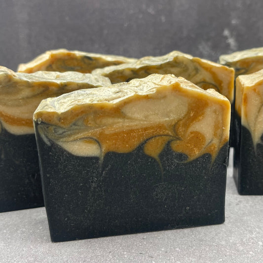 Charcoal & Tea Tree - A refreshing swirl of charcoal and botanicals for naturally clean, balanced skin.